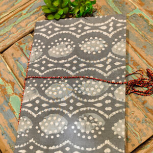 Fabric-bound notebook, secured with thread- Grey